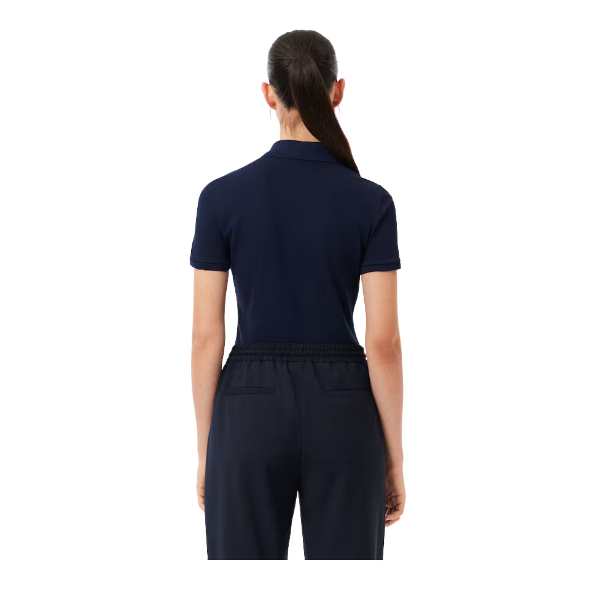 Polo Donna in tinta unita con logo sul petto modella retro