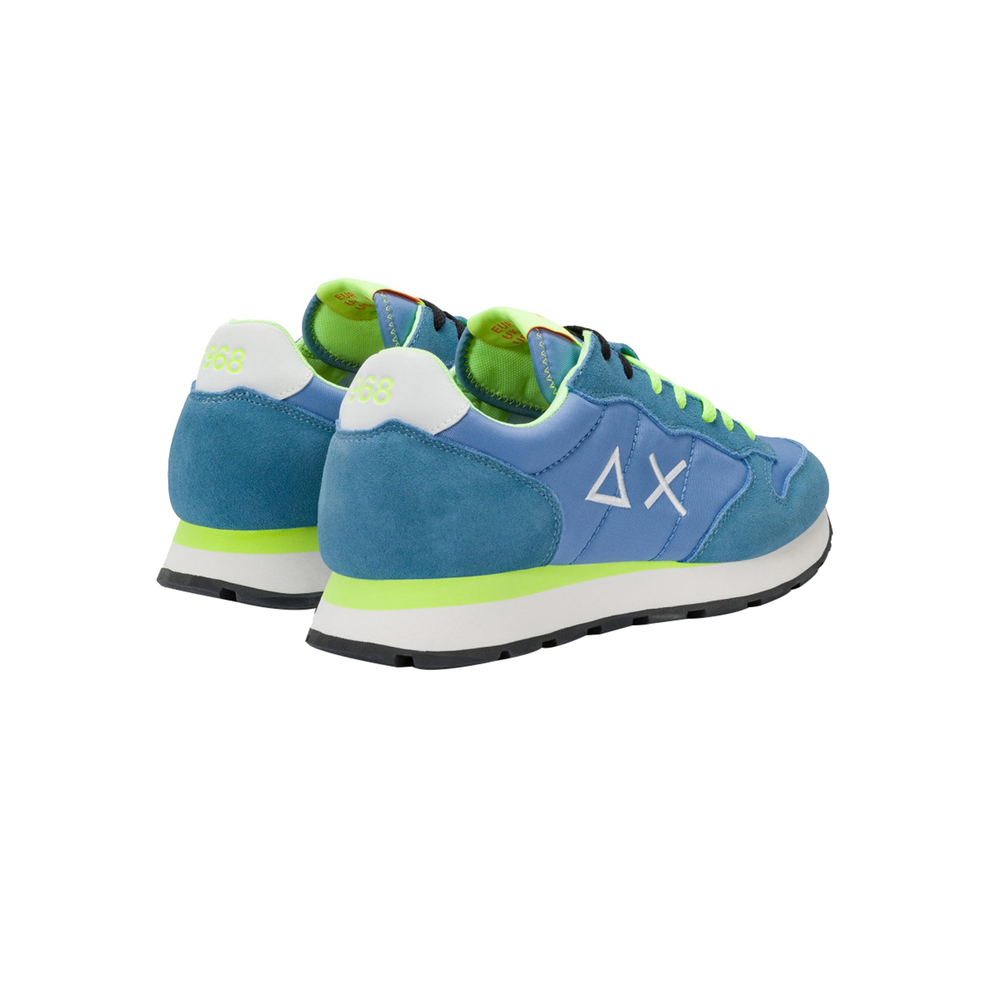 Sneakers Uomo con una tomaia in pelle e tessuto e dettagli fluo