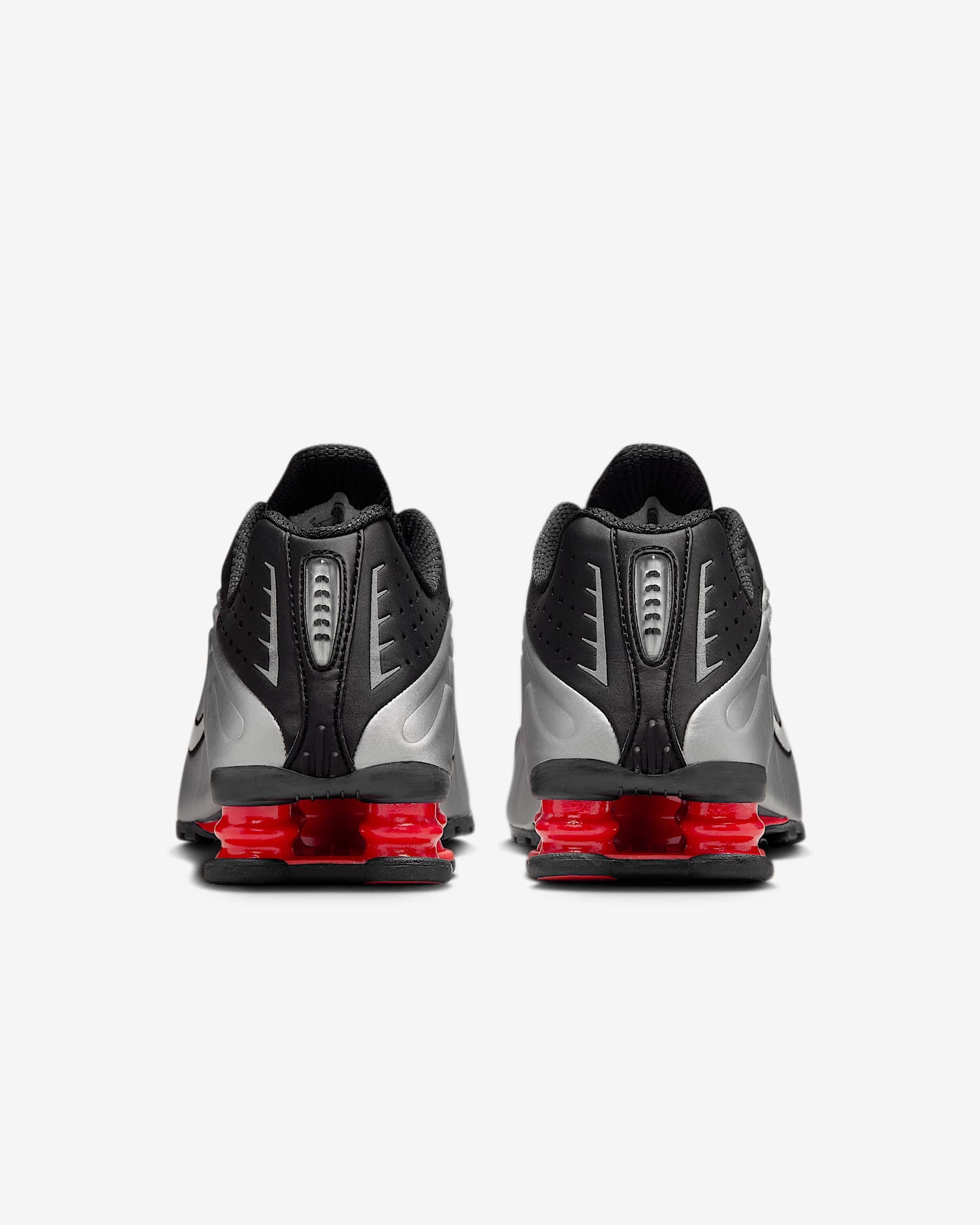 Sneakers Uomo Shox R4 Argento con molle a contrasto e logo laterale