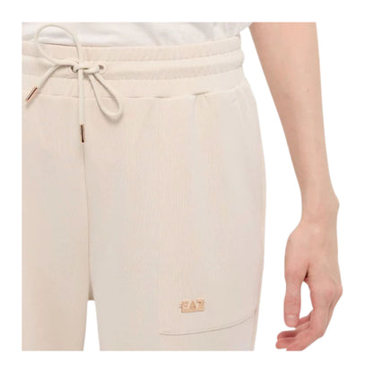 Pantaloni da donna beige con placca mini logo dettaglio