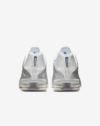 Sneakers Donna modello Shox R4 con molle 